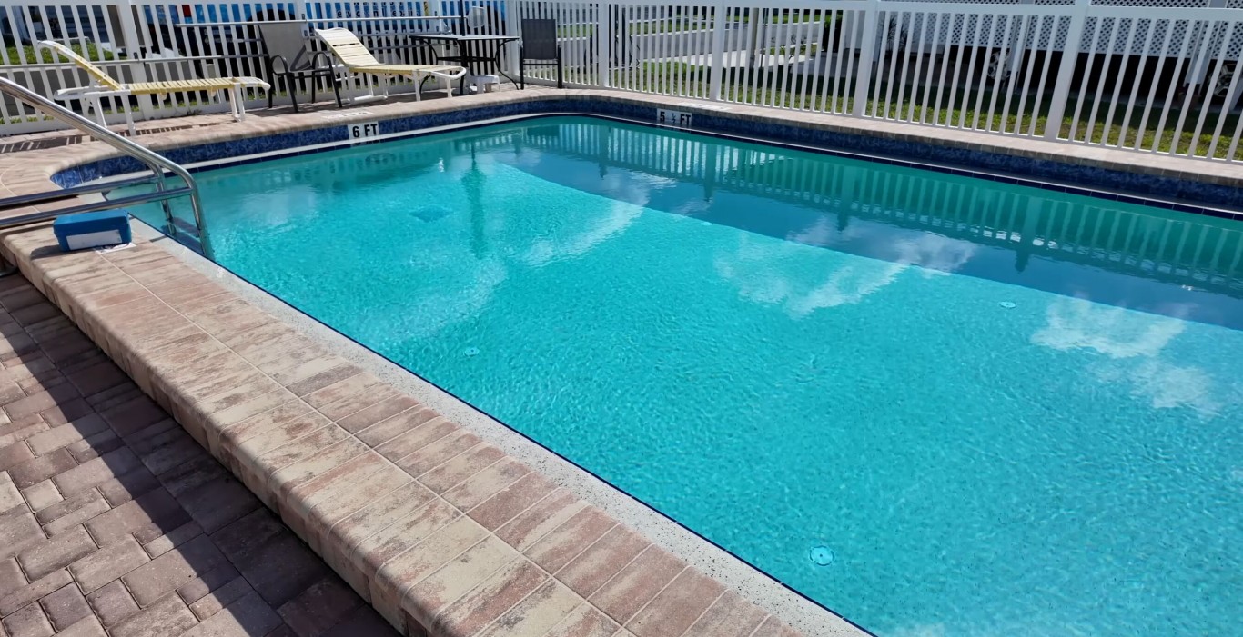 Professional weekly pool cleaning service maintaining crystal clear water in Seguin, TX